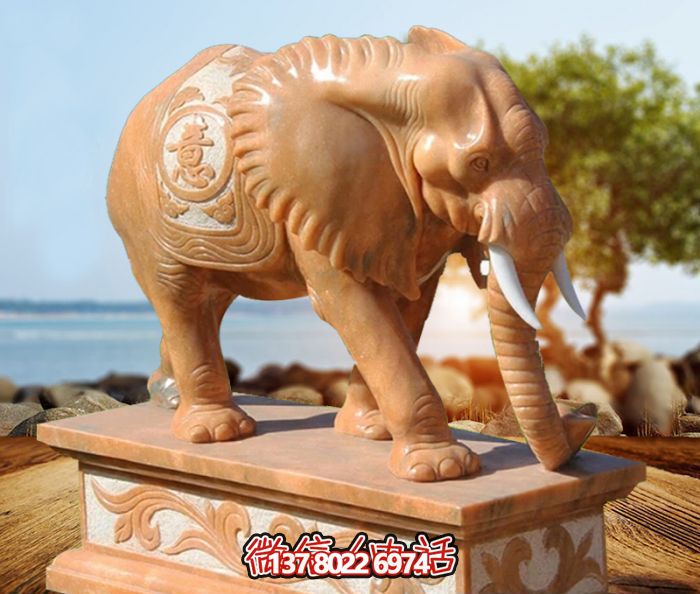 户外景区晚霞红石雕大象博鱼平台