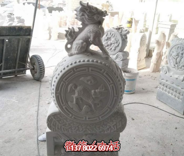 酒店门口创意石雕抱鼓石上面的麒麟博鱼平台