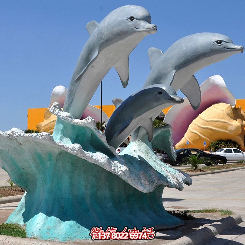 游乐场三只石雕海豚博鱼平台