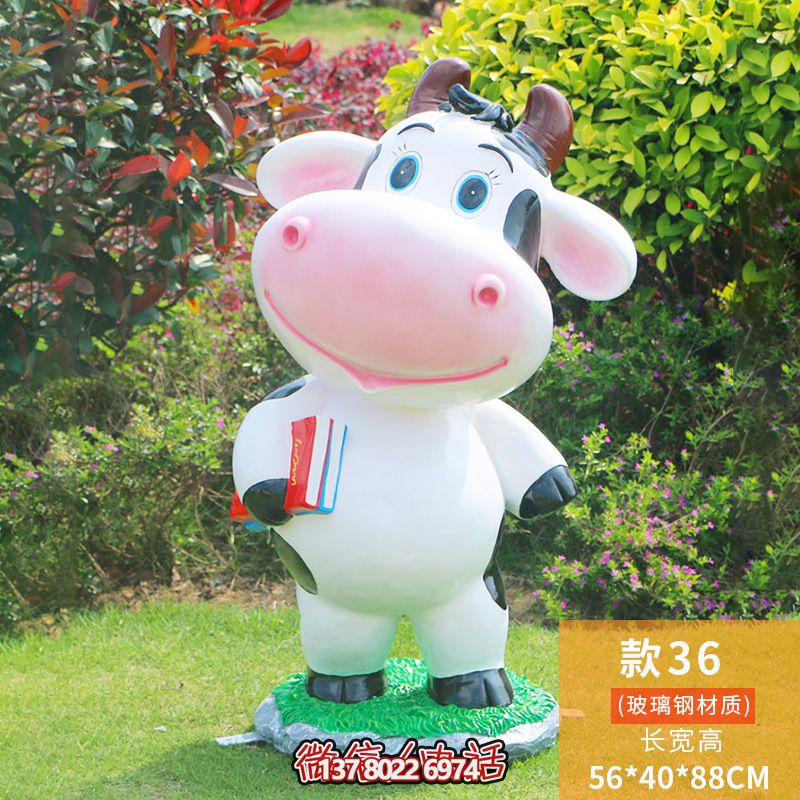 图书馆一只拿书的玻璃钢牛博鱼平台
