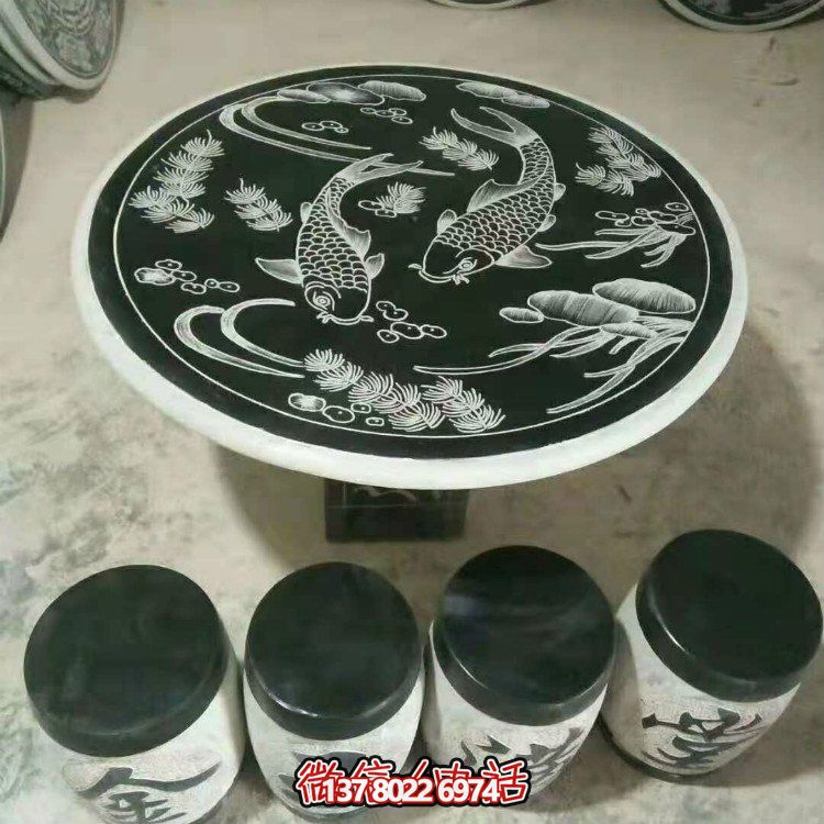 家用青石石雕浮雕双翼圆形石桌石凳博鱼平台