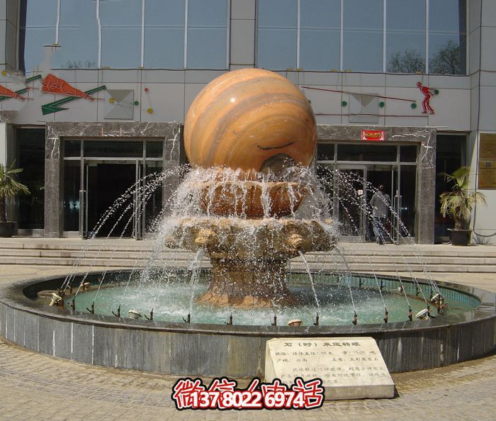 学校广场摆放晚霞红风水球喷泉石雕