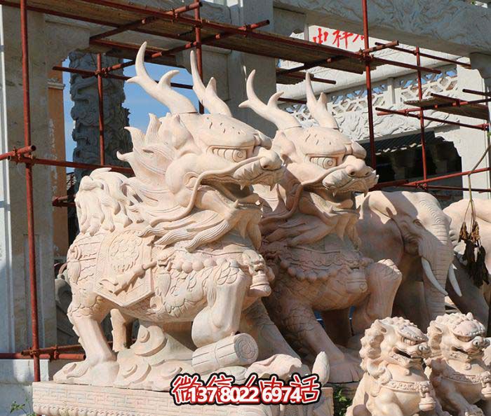 晚霞红石雕浮雕神兽户外园林麒麟博鱼平台